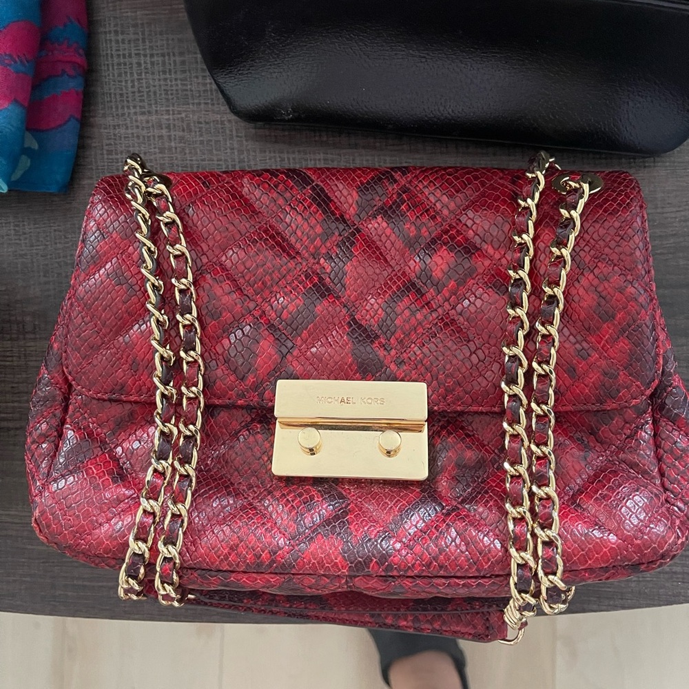 Red and black python leather Micheal Kors bag/ gold hardware. Condition good.